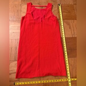 red coral sleeveless shift dress or a long tank top with an open back